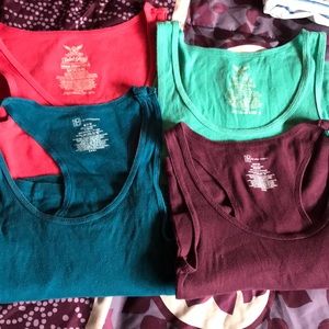 Set of 4 GUC tank tops